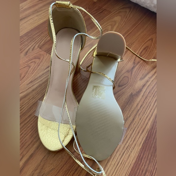 NEW. Size 37 (6.5) Metallic Gold / Clear Strap Tie Block Heel Sandals - Picture 2 of 4